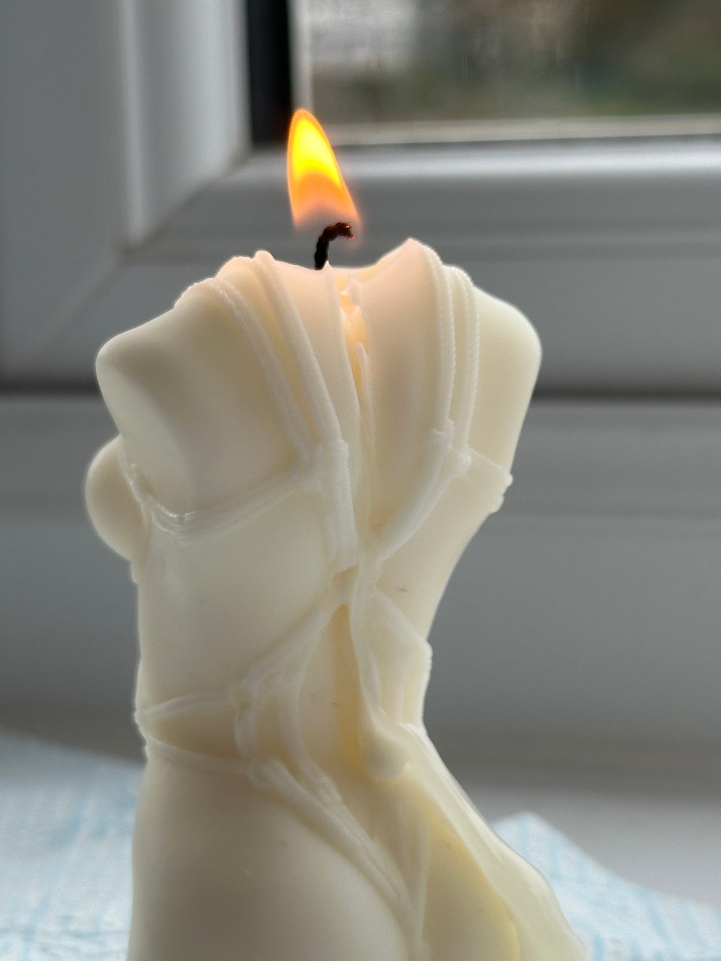 Woman body candle
